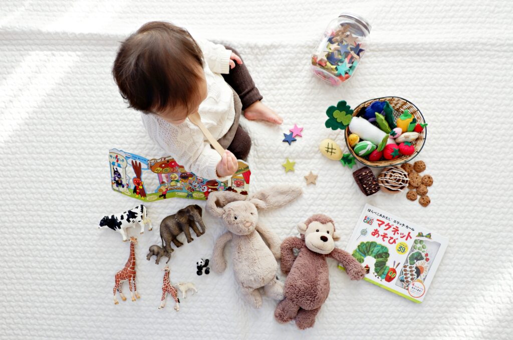 toddler with toys